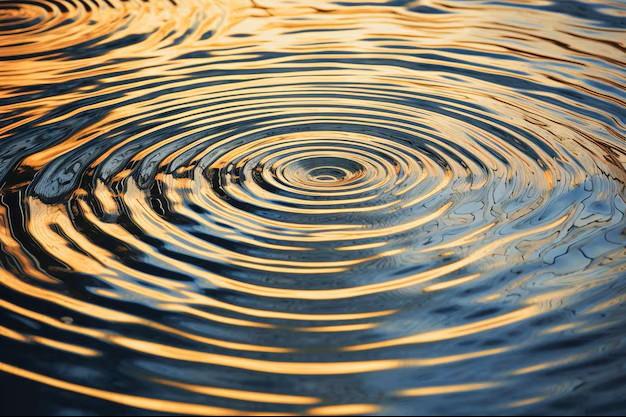 Gold and blue water ripples reflecting light.
